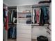 Organized walk-in closet with custom shelving and ample storage space for clothes, shoes, and accessories at 140 Robin Rd, Lincolnton, NC 28092
