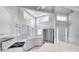 Bright kitchen with ample cabinets, stainless steel appliances, and many windows for natural lighting at 14053 Queens Harbor Rd, Charlotte, NC 28278