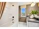 Bathroom with white tub and shower, sink and window at 15906 Parkside Crossing Dr # 317, Charlotte, NC 28273