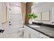 Modern bathroom with a sleek vanity, elegant finishes, and a separate tub and shower at 15906 Parkside Crossing Dr # 317, Charlotte, NC 28273