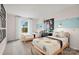 Bedroom with two twin beds, carpet, and space themed decorations at 15906 Parkside Crossing Dr # 317, Charlotte, NC 28273
