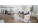 Open-concept living area connecting kitchen, dining, and living spaces for seamless entertaining and everyday living at 16112 Langston Dr, Charlotte, NC 28278