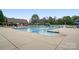 Community swimming pool and seating area, perfect for summer relaxation at 16112 Langston Dr, Charlotte, NC 28278