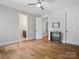 Bedroom features hardwood floors and doorways leading to other rooms, providing an open and inviting atmosphere at 172 Barber Loop, Mooresville, NC 28117