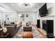 Bright living room with fireplace, hardwood floors, and modern decor at 2100 Chesterfield Ave, Charlotte, NC 28205