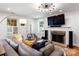 Bright living room with fireplace, hardwood floors, and modern decor at 2100 Chesterfield Ave, Charlotte, NC 28205