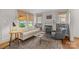 Light-filled living room with a fireplace, built-in shelves, and neutral decor, creating a comfortable setting at 2112 Shenandoah Ave, Charlotte, NC 28205