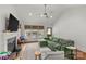 Spacious living room features a fireplace, large windows, and comfortable seating at 2112 Shenandoah Ave, Charlotte, NC 28205