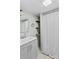 Bathroom with gray vanity, open shelves and shower with curtain at 2229 Old Wilkesboro Rd, Statesville, NC 28625