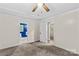 Spacious bedroom with neutral walls and carpet flooring at 2229 Old Wilkesboro Rd, Statesville, NC 28625