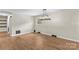 Classic chandelier in a dining room with hardwood floors at 2229 Old Wilkesboro Rd, Statesville, NC 28625