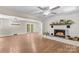 Spacious living room showcasing the fireplace, hardwood floors, and open layout at 2229 Old Wilkesboro Rd, Statesville, NC 28625