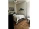 Bedroom featuring a full-size bed with hardwood floors at 2300 Wednesbury Ct, Kannapolis, NC 28083