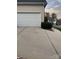 Exterior view of a white garage door with a concrete driveway at 2300 Wednesbury Ct, Kannapolis, NC 28083