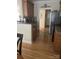 Well-lit kitchen with stainless steel appliances, granite countertops, and hardwood floors, perfect for cooking and entertaining at 2300 Wednesbury Ct, Kannapolis, NC 28083