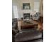 The living room includes a fireplace, mantle, and neutral wall colors at 2300 Wednesbury Ct, Kannapolis, NC 28083
