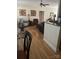 Spacious living room with hardwood floors, neutral paint, and comfortable seating, creating a relaxing atmosphere at 2300 Wednesbury Ct, Kannapolis, NC 28083