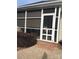 Cozy screened porch with comfortable seating, perfect for relaxing outdoors at 2300 Wednesbury Ct, Kannapolis, NC 28083
