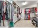Bright walk-in closet featuring a custom organizing system with shelves and hanging storage at 2816 Woodlands Creek Dr, Monroe, NC 28110