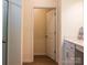 Well-lit bathroom offers modern fixtures and neutral tones and a walk-in closet at 2921 Parkwest Dr, Albemarle, NC 28001