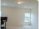 Bedroom features neutral walls, carpet, a window, and a closet at 2921 Parkwest Dr, Albemarle, NC 28001