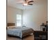 Serene bedroom boasts neutral tones, a comfortable bed, and a functional layout for relaxation and rest at 2921 Parkwest Dr, Albemarle, NC 28001