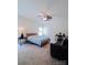 Spacious bedroom featuring a large bed, seating area, and ample natural light for a relaxing atmosphere at 2921 Parkwest Dr, Albemarle, NC 28001