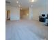 Spacious bonus room with neutral walls and carpet, recessed lighting, and a bathroom at 2921 Parkwest Dr, Albemarle, NC 28001