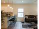 Open living room featuring a modern design with hardwood floors and bright natural light at 2921 Parkwest Dr, Albemarle, NC 28001