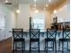 Open-concept living area with kitchen bar, perfect for entertaining and Gathering gatherings at 2921 Parkwest Dr, Albemarle, NC 28001