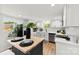 Bright kitchen featuring white cabinets, butcher block island, and stainless steel dishwasher at 300 Cherry St, Belmont, NC 28012