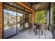 Relax on the balcony, featuring sliding glass doors and outdoor seating perfect for entertaining at 3026 Kalex Ct, Charlotte, NC 28204