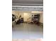 Spacious garage with stairs, organization, and epoxy flooring at 3026 Kalex Ct, Charlotte, NC 28204