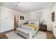 Sunlit main bedroom boasts a comfortable bed, stylish decor, and an en-suite bathroom at 3026 Kalex Ct, Charlotte, NC 28204