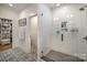 Luxurious walk-in shower features sleek tiling, glass doors, and modern fixtures at 3026 Kalex Ct, Charlotte, NC 28204