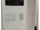 Close-up of a wall with several light switches for controlling different settings in the home at 3026 Kalex Ct, Charlotte, NC 28204