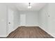 Bedroom with hardwood flooring, recessed lighting, a closet, and white walls at 3207 Selwyn Landing Dr, Charlotte, NC 28215