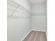 Walk-in closet with carpeted floor and white wire shelving at 3207 Selwyn Landing Dr, Charlotte, NC 28215