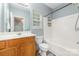 Bathroom with a single sink vanity, toilet, and shower-tub combination at 3561 Calpella Ct, Charlotte, NC 28262