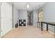 Bright bonus room features neutral carpet and calming, light-blue walls with a walk-in closet at 3561 Calpella Ct, Charlotte, NC 28262