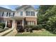 Charming two-story townhouse with a brick facade and well-manicured landscaping at 3561 Calpella Ct, Charlotte, NC 28262
