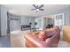 Spacious living room with weights, storage, french doors, and leather sofa at 3561 Calpella Ct, Charlotte, NC 28262