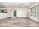 Spacious open-concept living room featuring hardwood floors and natural light at 3561 Calpella Ct, Charlotte, NC 28262