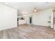 Bright and airy living room with light hardwood floors and open concept at 3561 Calpella Ct, Charlotte, NC 28262