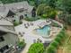 Aerial view showcasing a custom-designed pool and patio area perfect for outdoor relaxation and enjoyment at 3587 Ridgetop Rd, Sherrills Ford, NC 28673
