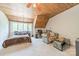 Cozy upper-level bedroom with wood ceiling and multiple use space at 3587 Ridgetop Rd, Sherrills Ford, NC 28673