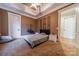 Comfortable bedroom with a tray ceiling, neutral colors and decorative wall art at 3587 Ridgetop Rd, Sherrills Ford, NC 28673