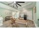 Relaxing bonus room with stylish ceiling fan, accent wall and comfortable seating at 3587 Ridgetop Rd, Sherrills Ford, NC 28673