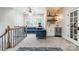 Upper level bonus room featuring a wine bar, plush seating and stylish finishes at 3587 Ridgetop Rd, Sherrills Ford, NC 28673