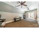 Spacious bonus room with a double door, carpet flooring and two ceiling fans at 3587 Ridgetop Rd, Sherrills Ford, NC 28673